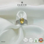 Radiant Golden Topaz halo ring crafted in genuine 925 sterling silver featuring an oval-cut golden topaz centre stone surrounded by sparkling cubic zirconia and a luxurious multi-row pavé band.
