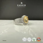 Radiant Golden Topaz halo ring crafted in genuine 925 sterling silver featuring an oval-cut golden topaz centre stone surrounded by sparkling cubic zirconia and a luxurious multi-row pavé band.