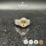 Radiant Golden Topaz halo ring crafted in genuine 925 sterling silver featuring an oval-cut golden topaz centre stone surrounded by sparkling cubic zirconia and a luxurious multi-row pavé band.