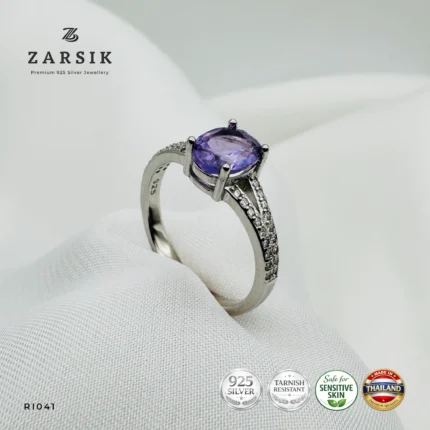 Majestic Purple Amethyst 925 Silver solitaire ring featuring an oval-cut natural amethyst, sparkling cubic zirconia split shoulders and premium rhodium plating.